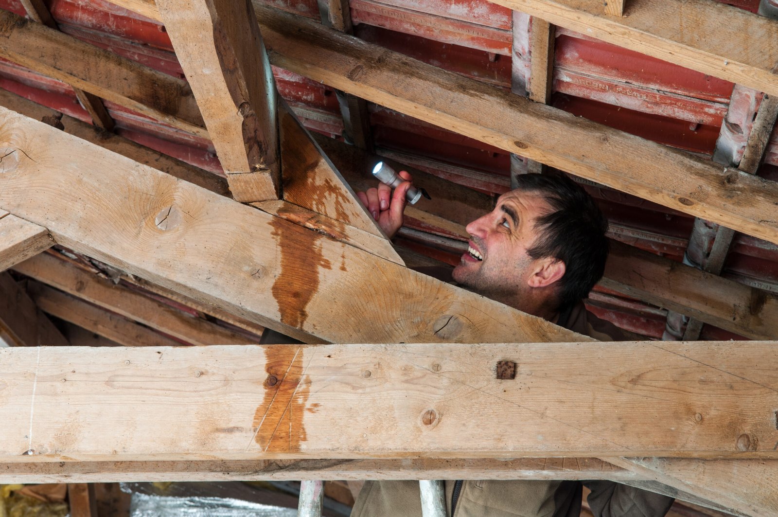 Roofer in Durham, On inspecting a residential roof in the homes attic for a leaking roof problem.
